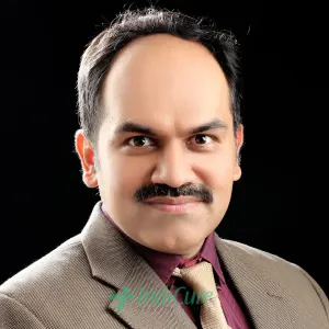 Dr Anil Kamath