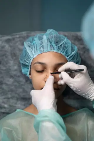 image of Rhinoplasty (Nose Job) underway by a plastic surgeon